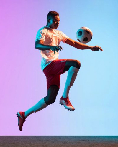 one-man-professional-soccer-football-player-training-isolated-gradient-wall_155003-37515-min
