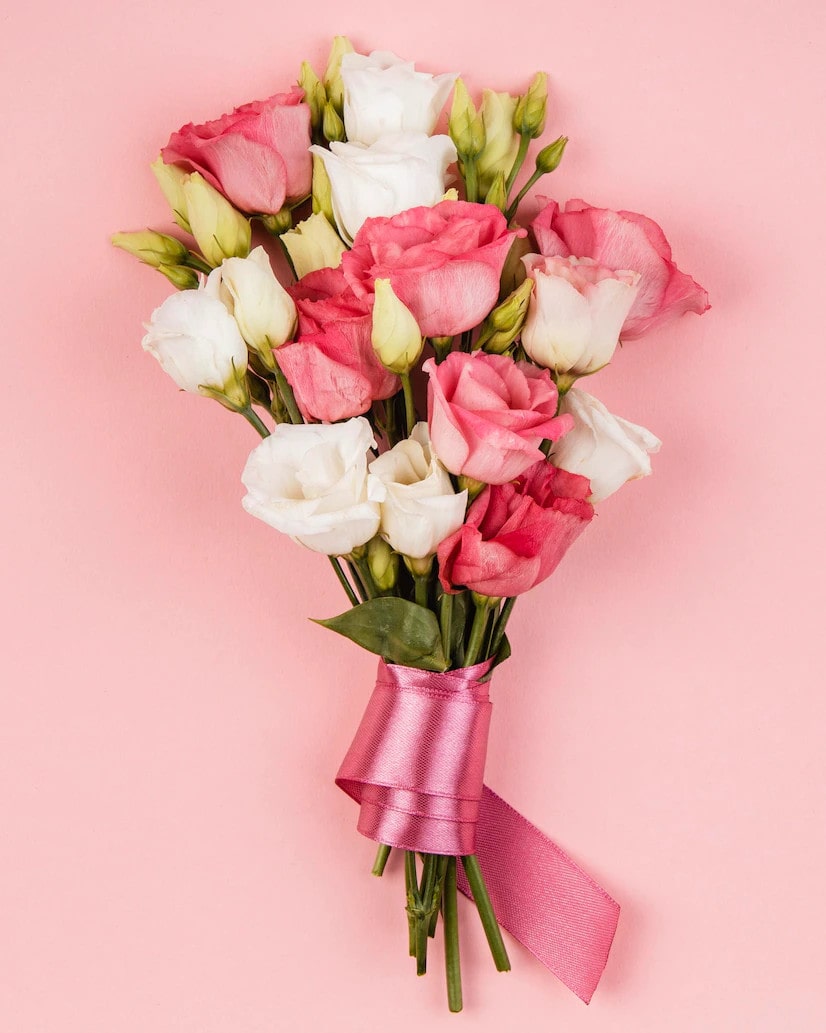 top-view-beautiful-roses-bouquet-with-pink-ribbon_23-2148822309-min